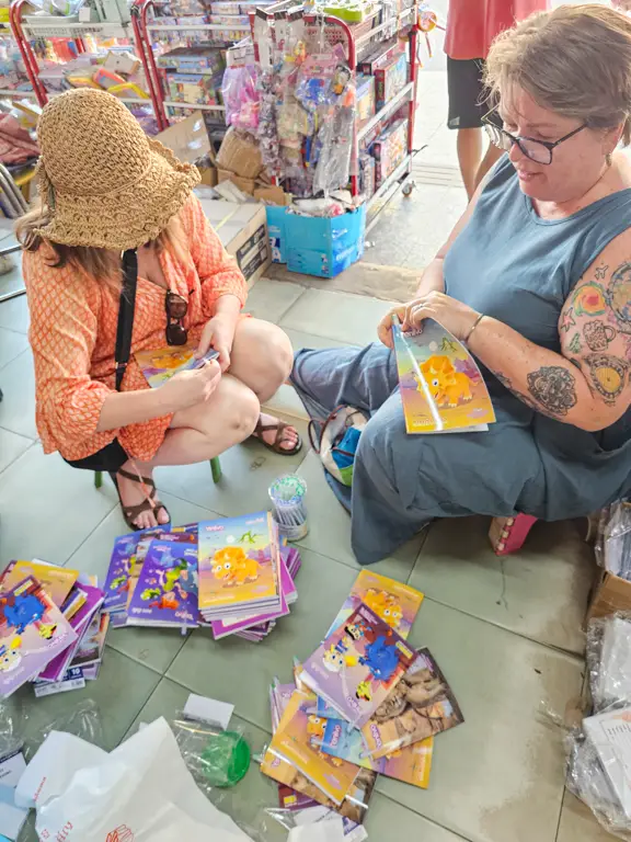 Buying books and pens for Siem Reap children